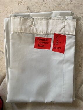Blackout curtain panel 21 inches wide by 118 inches long, ecru color